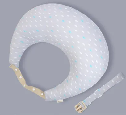 Multifunction nursing pillow with adjustable strap and white cotton cover for breastfeeding and baby support.