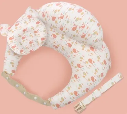Multifunction nursing pillow with adjustable strap and white cotton cover for breastfeeding and baby support.