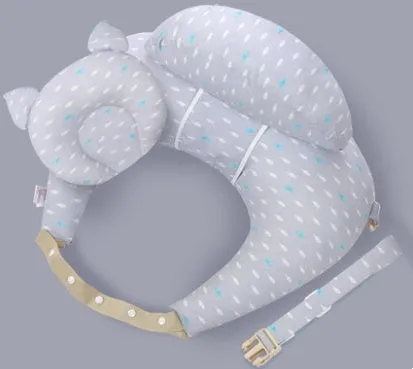 Multifunction nursing pillow with adjustable strap and white cotton cover for breastfeeding and baby support.
