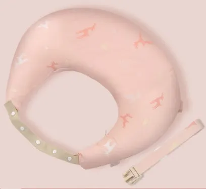 Multifunction nursing pillow with adjustable strap and white cotton cover for breastfeeding and baby support.