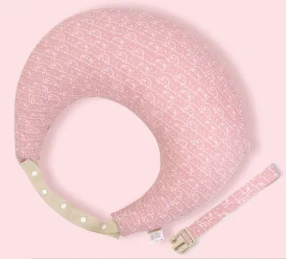 Multifunction nursing pillow with adjustable strap and white cotton cover for breastfeeding and baby support.
