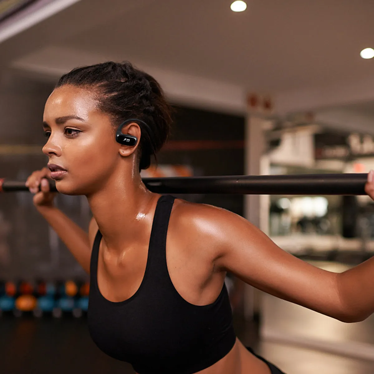 Wireless Bluetooth headset with bilateral earbuds, hanging ear design, 10m range, in black