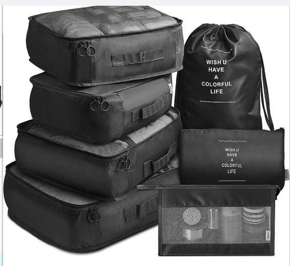 8-piece set of nylon packing cubes in various colours for travel storage of clothes, shoes, and toiletries