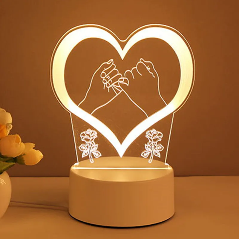 3D acrylic USB LED night light with unicorn design and warm white projection on a desk