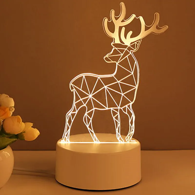 3D acrylic USB LED night light with unicorn design and warm white projection on a desk