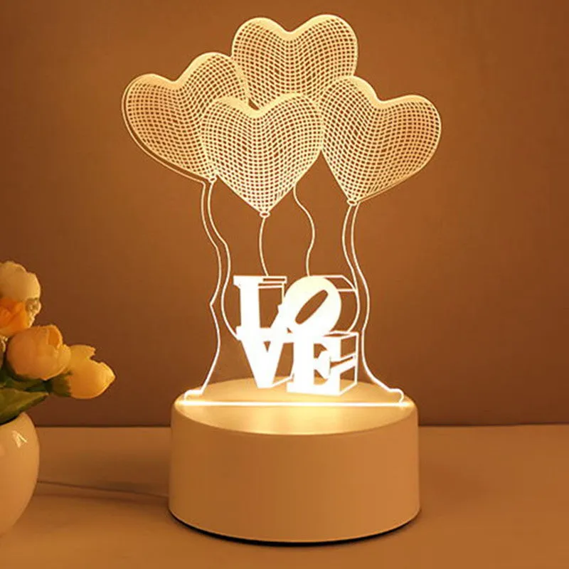 3D acrylic USB LED night light with unicorn design and warm white projection on a desk