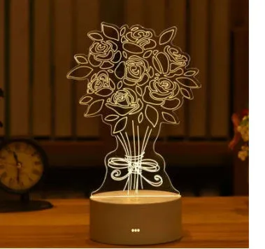 3D acrylic USB LED night light with unicorn design and warm white projection on a desk