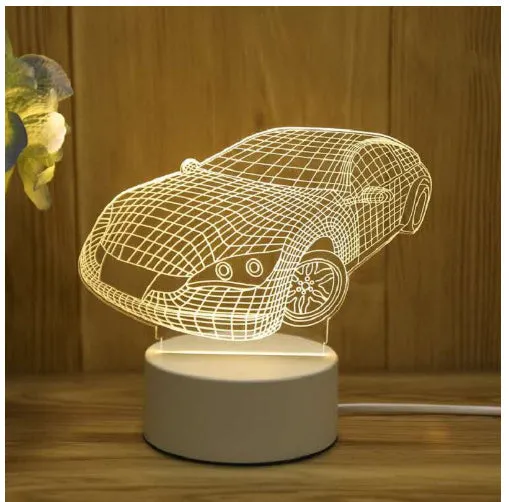 3D acrylic USB LED night light with unicorn design and warm white projection on a desk