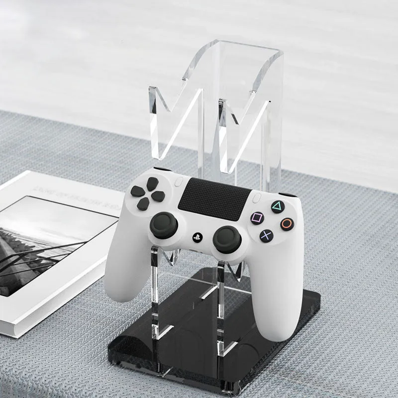 Compact controller stand for PS5 and Xbox Series in black bracket finish, measuring 11cm by 9.3cm, with a single controller placed upright