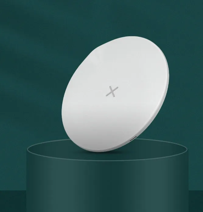 Ultra-thin round 15W wireless charger in Black with indicator light on a desk
