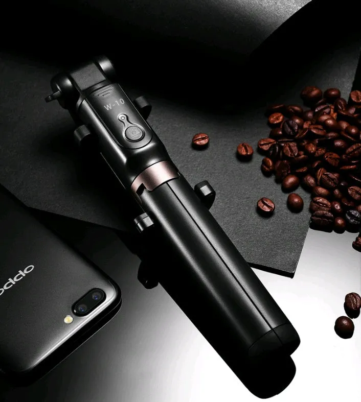 Aluminium Bluetooth selfie stick with tripod base and remote control extended with mobile phone attached