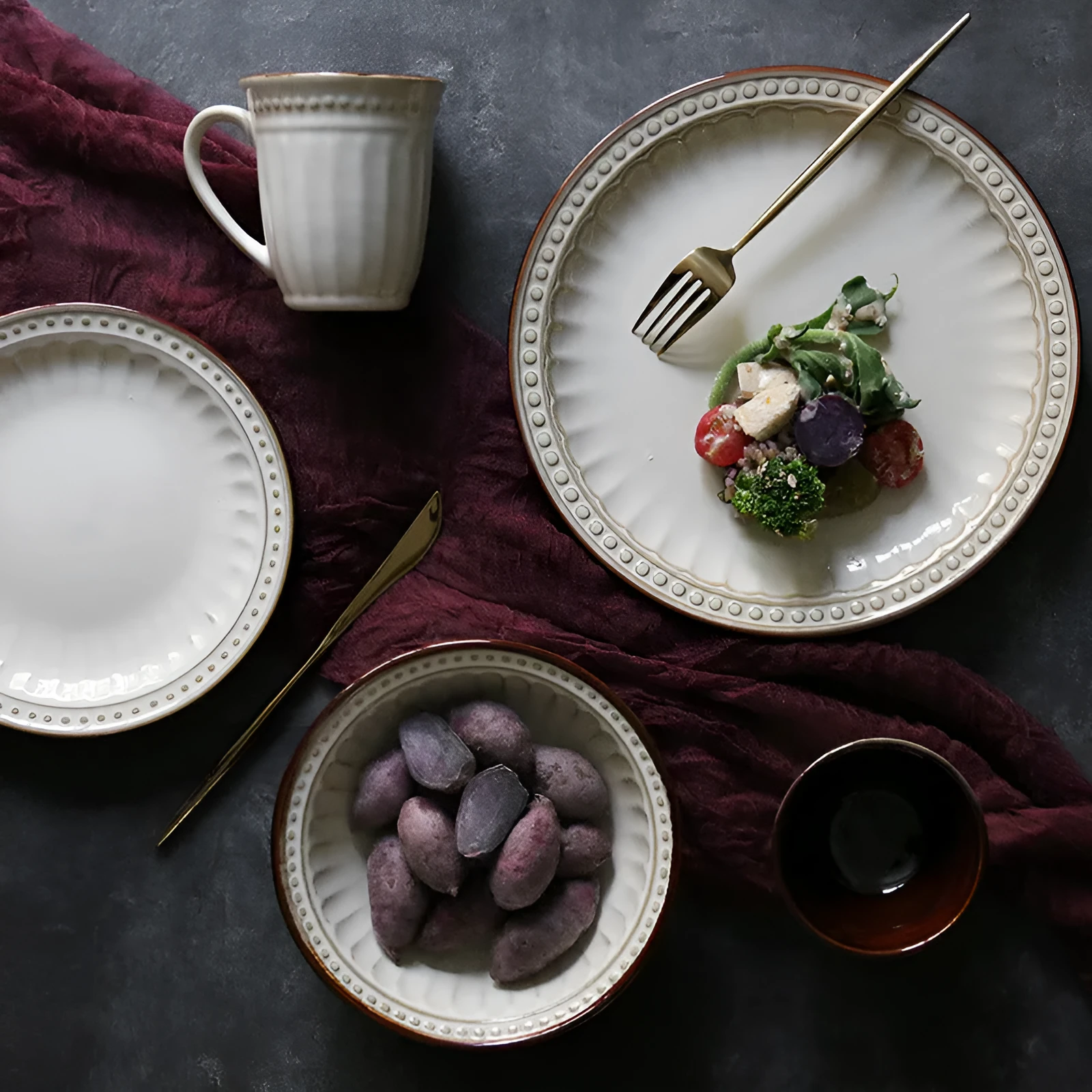 Set of five relief ceramic stoneware plates in retro European design with kiln change relief texture, available in colours C1 to C5