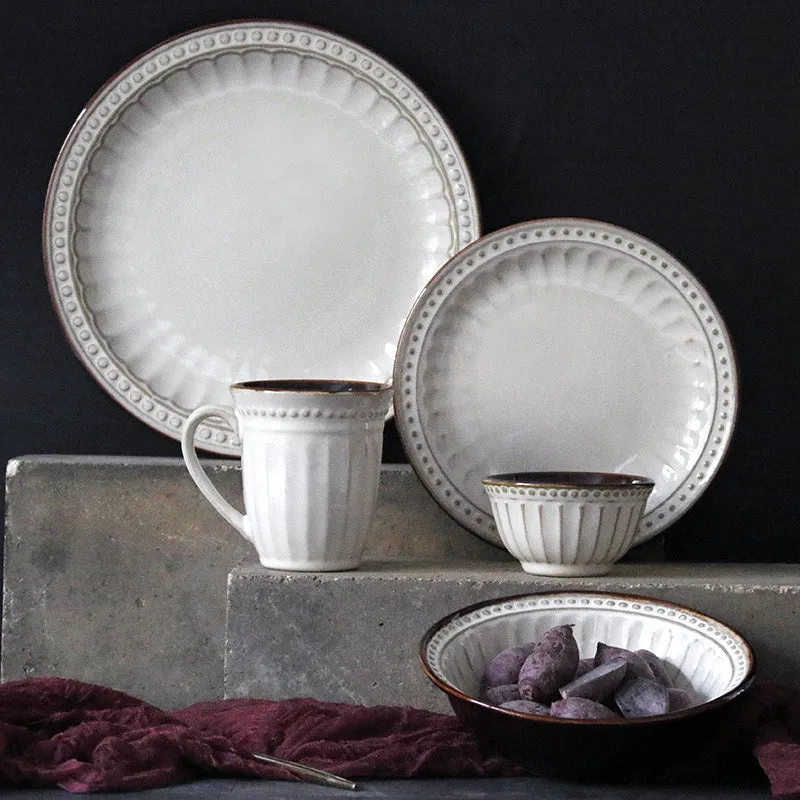 Set of five relief ceramic stoneware plates in retro European design with kiln change relief texture, available in colours C1 to C5