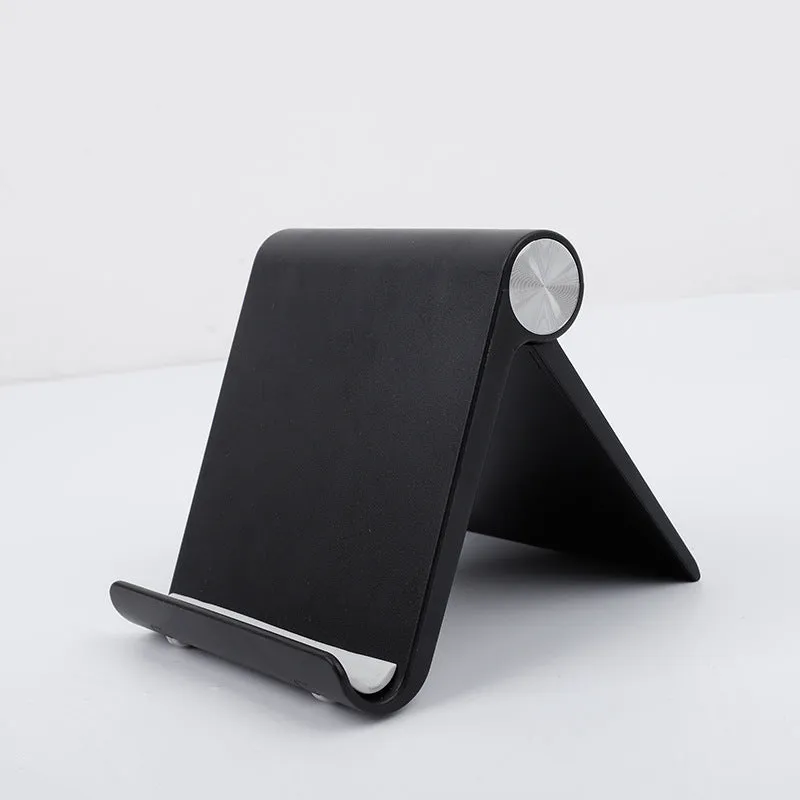 Folding plastic desktop stand holding a smartphone in black colour on a desk