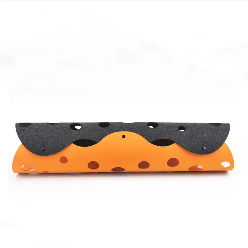 Deformable felt cat tunnel with peepholes in cement grey and orange, assembled on floor