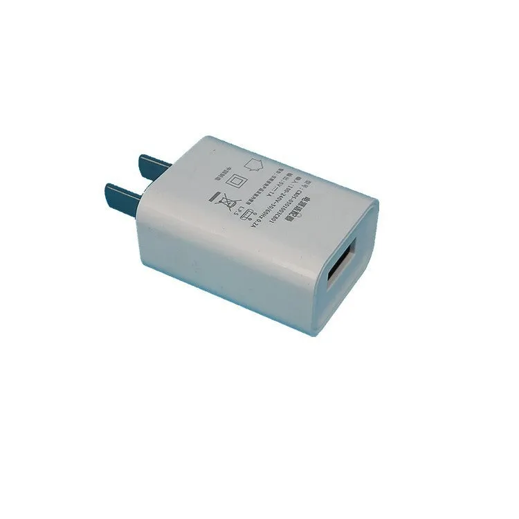 Compact thin white 5V 1A USB power adapter with CE and FCC marks.