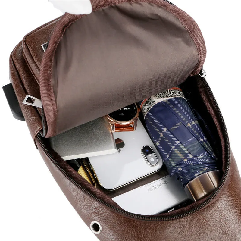 USB portable charging chest bag in PU leather with zipper closure, black colour, front pocket visible