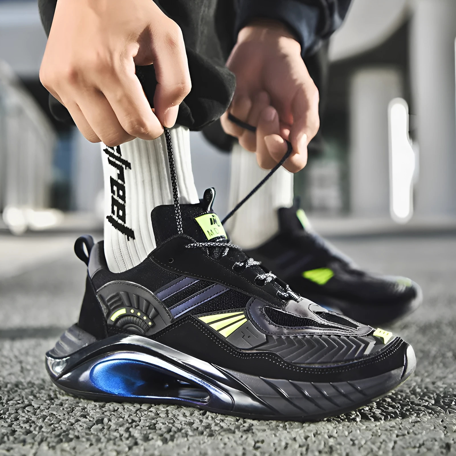 Men's casual running shoes with Flying Weave upper, cross straps, and thick sole in black and white