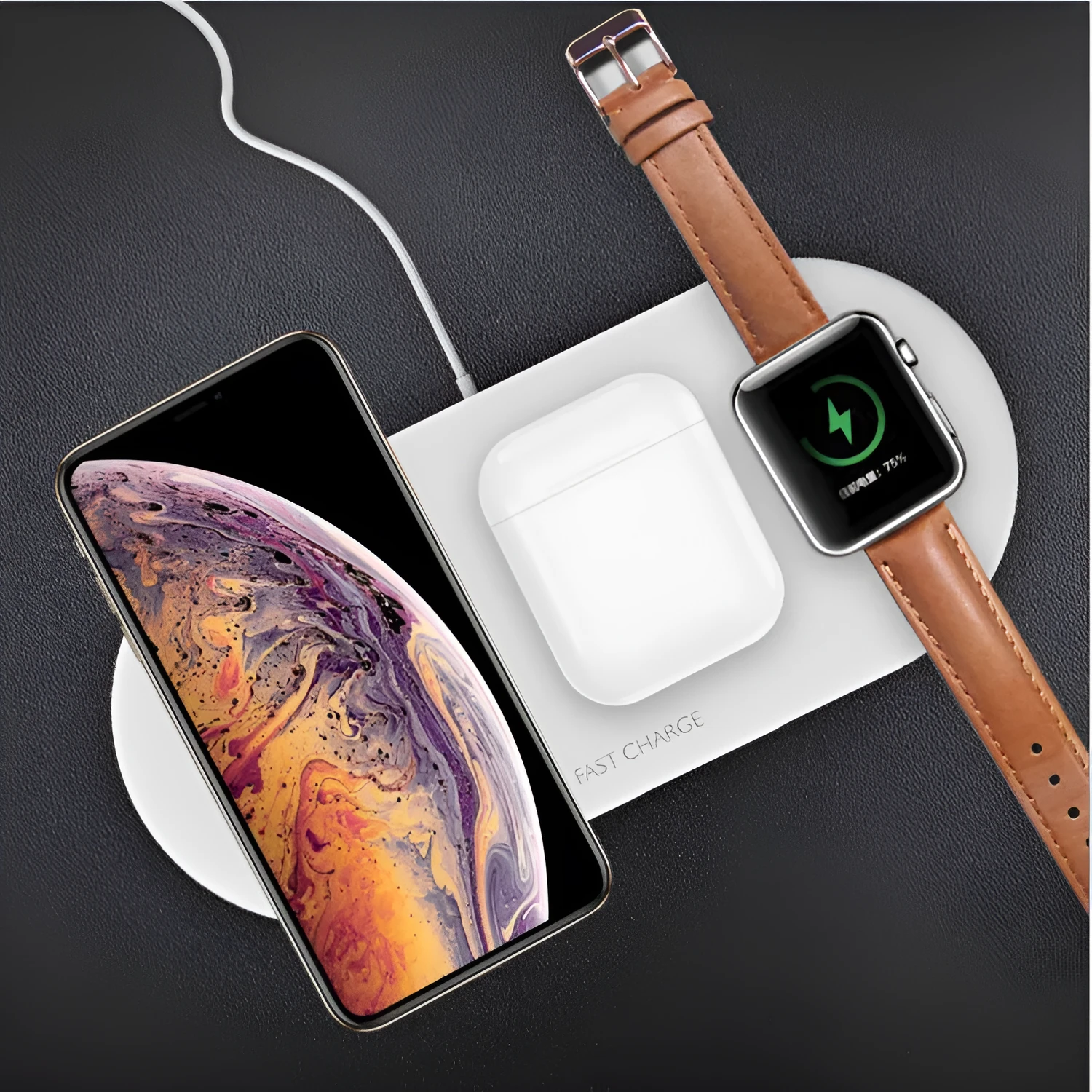 Black three-in-one wireless charging station for Apple mobile phone, iWatch and headphones on desktop