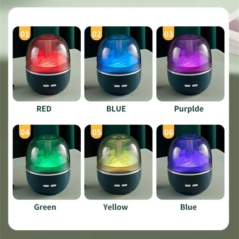 Green ultrasonic aromatherapy humidifier with heavy fog and colourful gradient light on a desk
