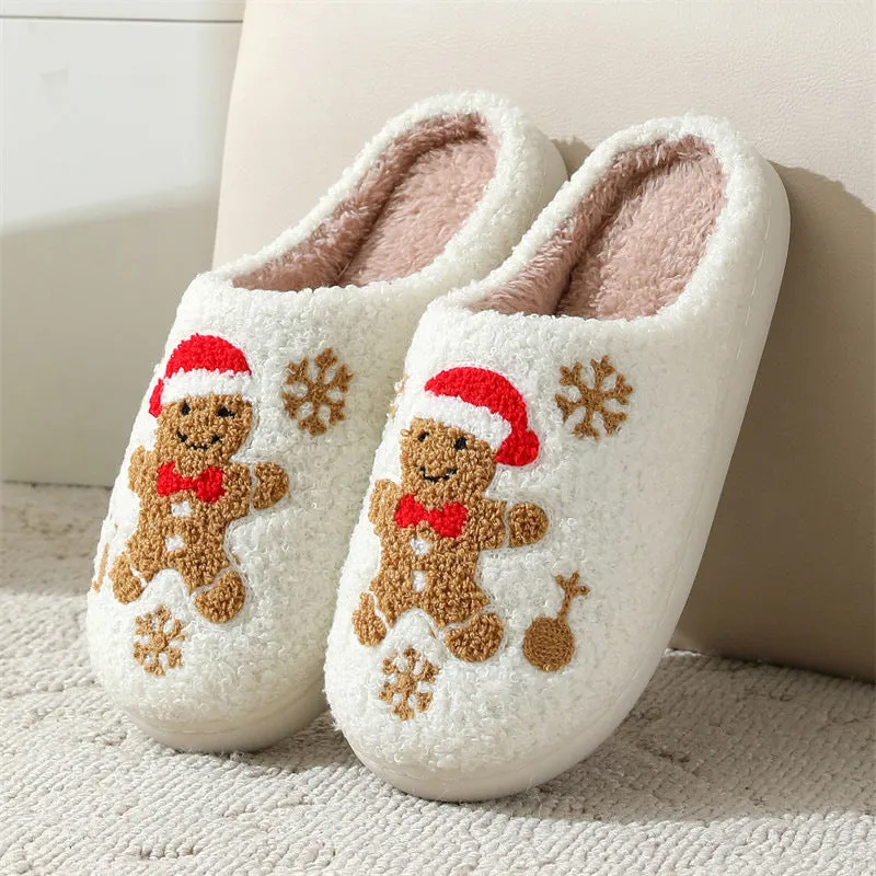 Christmas snowflake gingerbread pattern slippers with plush upper and TPR sole on a wooden floor