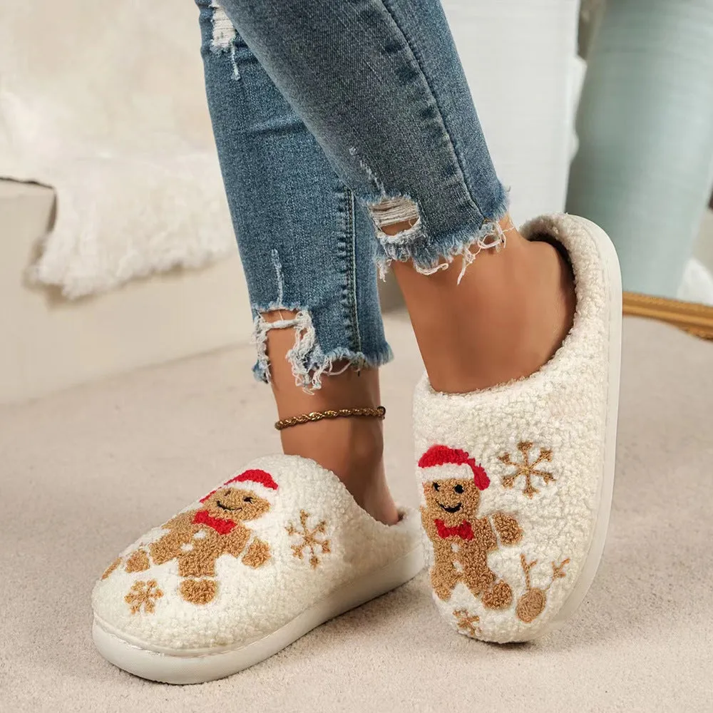Christmas snowflake gingerbread pattern slippers with plush upper and TPR sole on a wooden floor