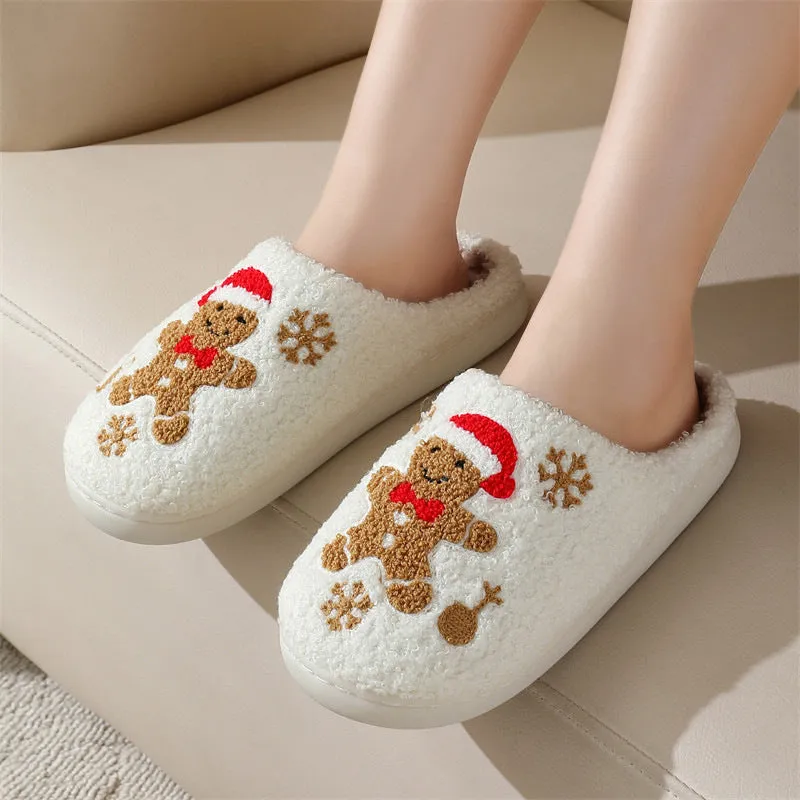 Christmas snowflake gingerbread pattern slippers with plush upper and TPR sole on a wooden floor