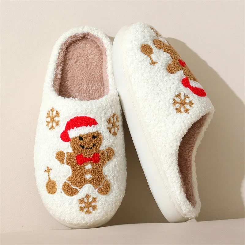 Christmas snowflake gingerbread pattern slippers with plush upper and TPR sole on a wooden floor