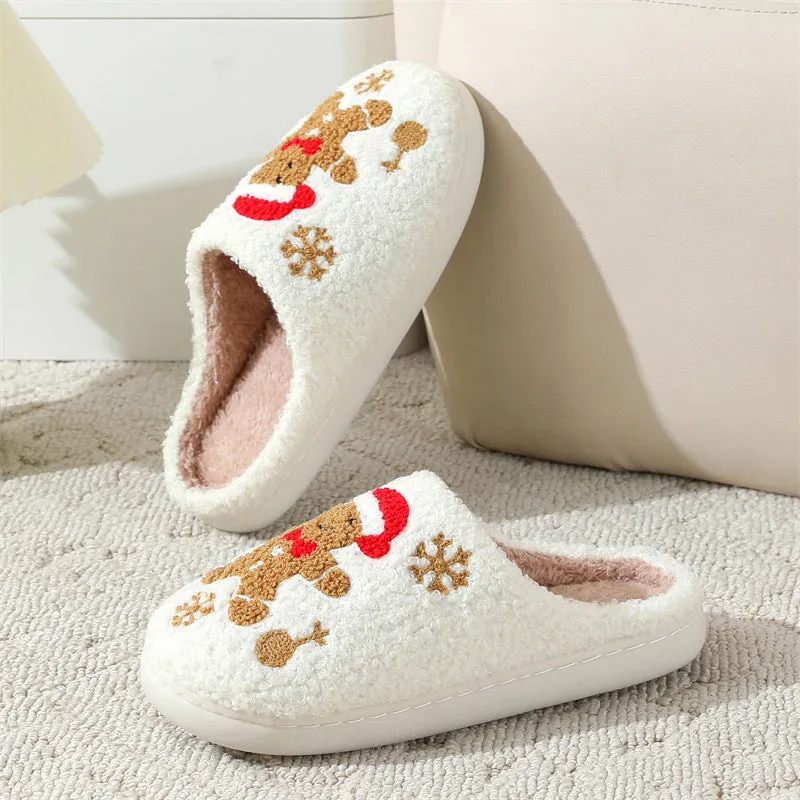 Christmas snowflake gingerbread pattern slippers with plush upper and TPR sole on a wooden floor