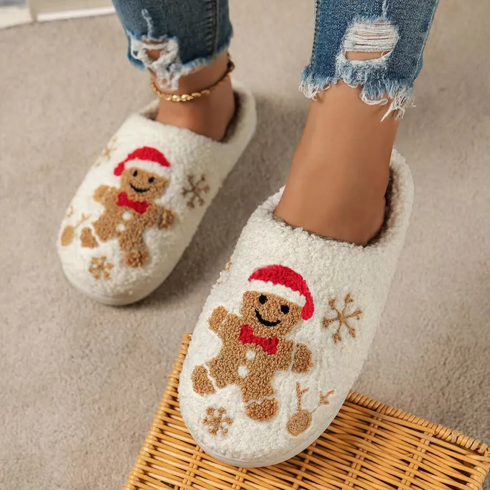 Christmas snowflake gingerbread pattern slippers with plush upper and TPR sole on a wooden floor