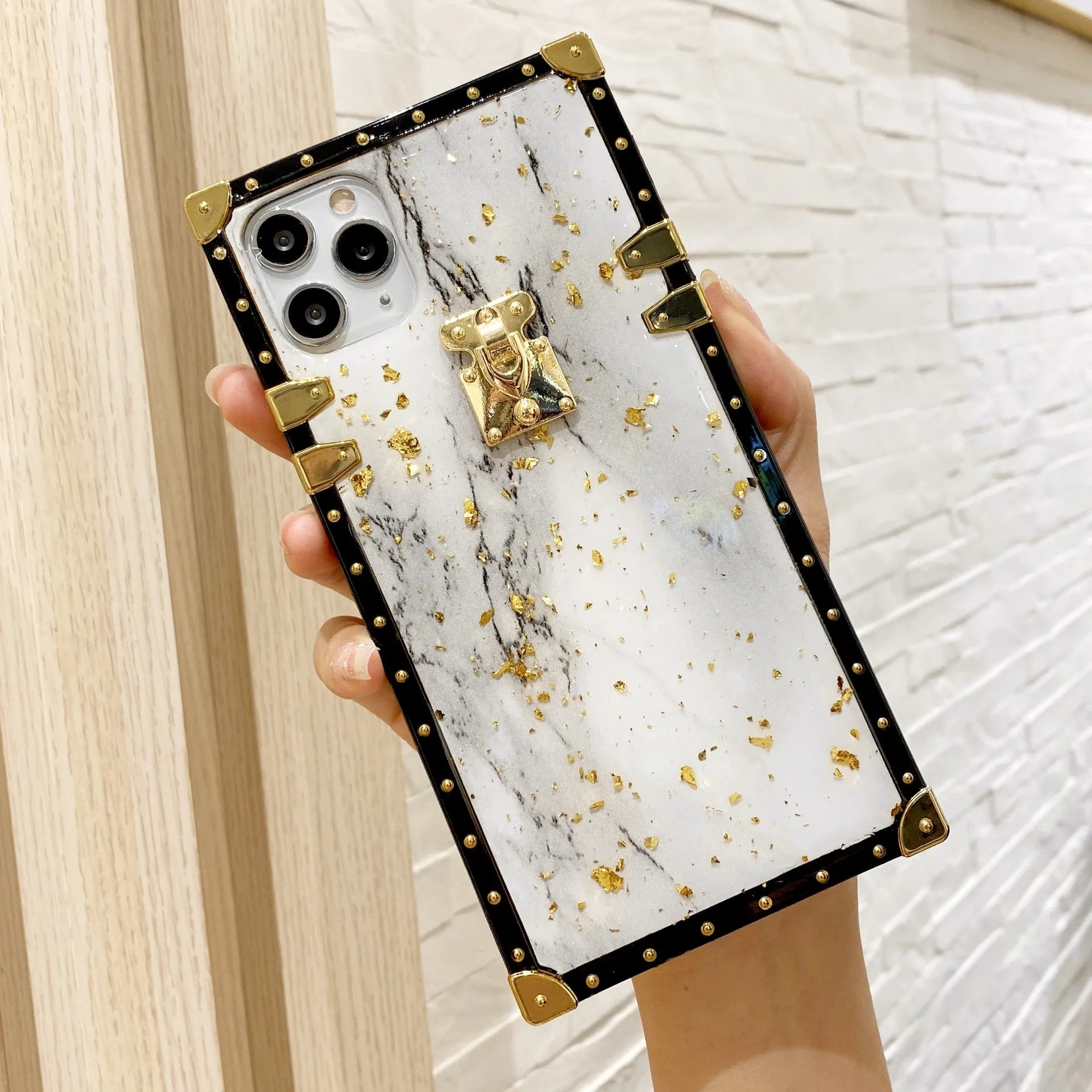 Marbled gold foil epoxy TPU phone case back cover for Apple iPhone and Samsung models in solid colour with gold accents
