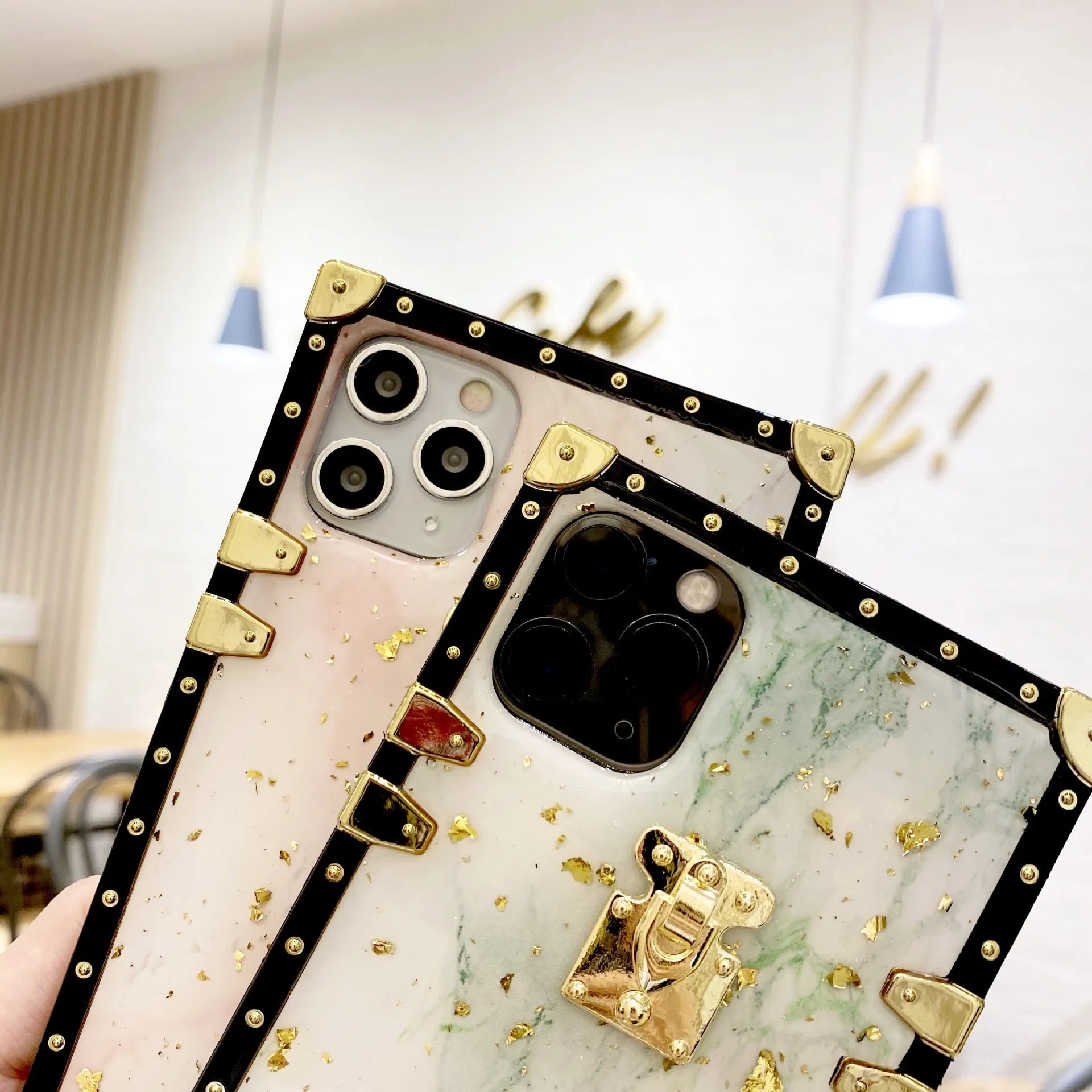 Marbled gold foil epoxy TPU phone case back cover for Apple iPhone and Samsung models in solid colour with gold accents
