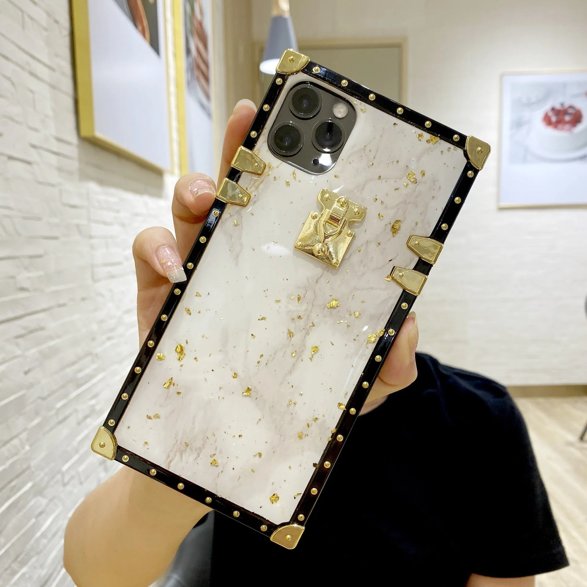 Marbled gold foil epoxy TPU phone case back cover for Apple iPhone and Samsung models in solid colour with gold accents