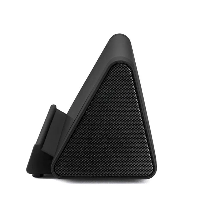 Black and white wireless mini Bluetooth speaker with built-in charging cable