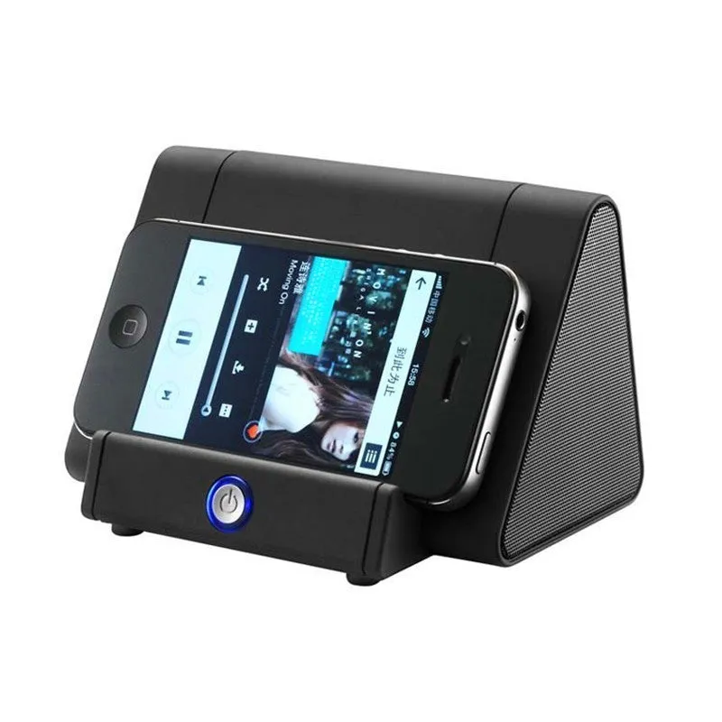 Black and white wireless mini Bluetooth speaker with built-in charging cable