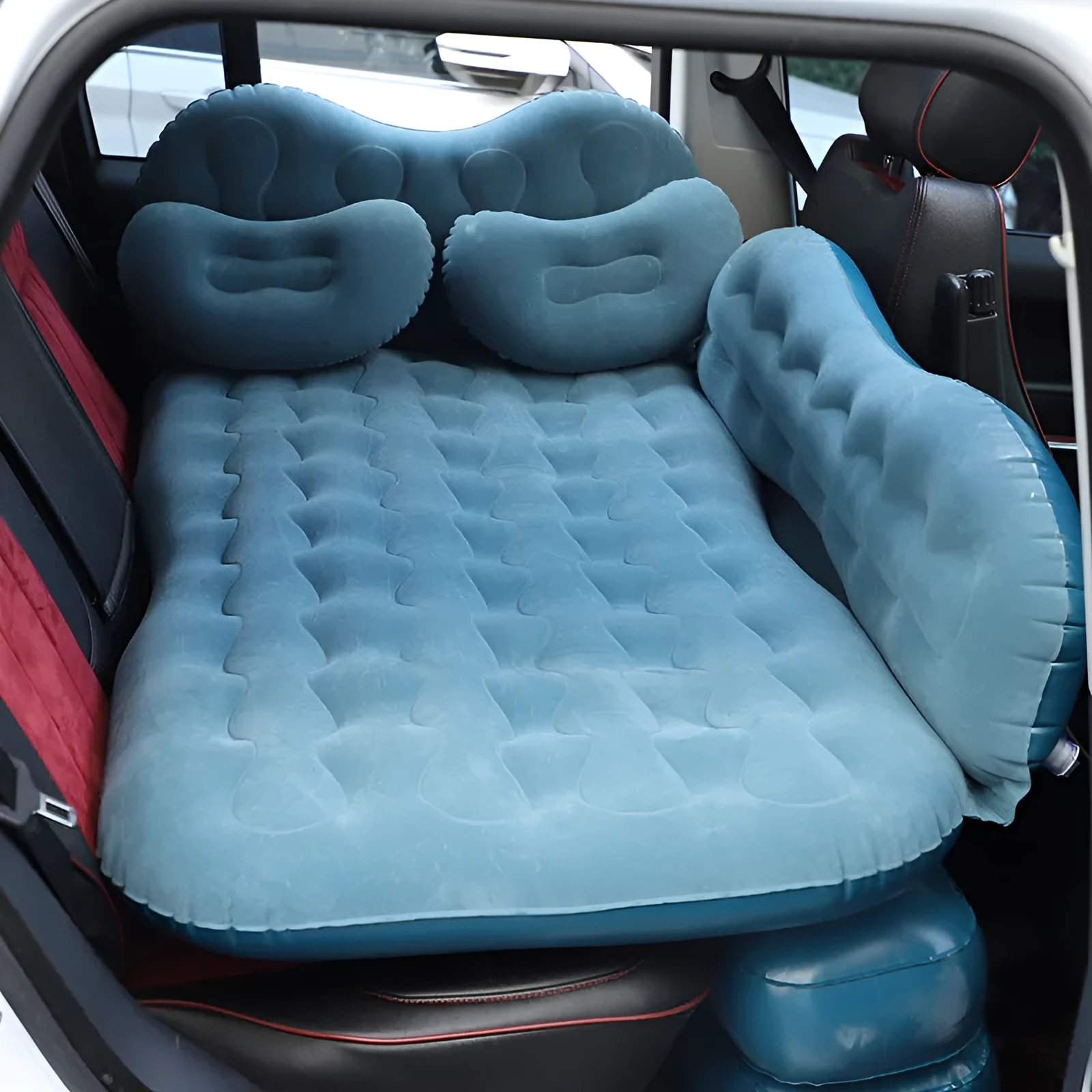 Blue car inflatable mattress with two pillows folded for storage, 135x70cm