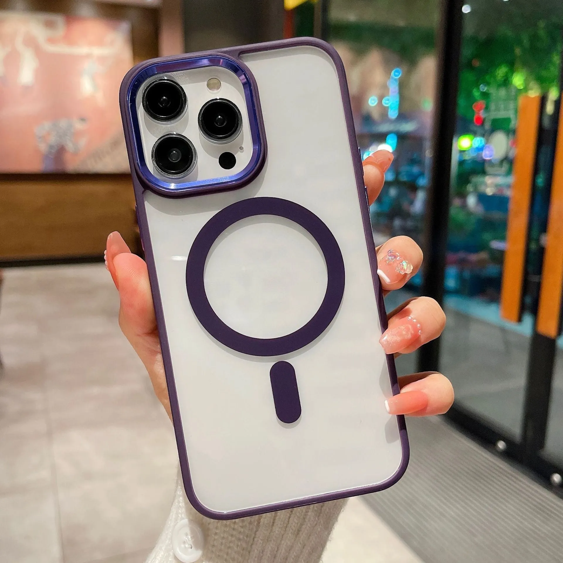 Lens transparent magnetic phone case for iPhone showing hard shell in purple colour