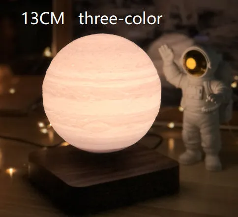 Magnetic levitation moon night light with 14cm 3D-printed planet suspended above a dark peach wood base