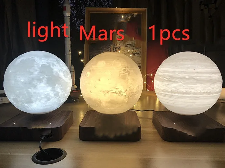 Magnetic levitation moon night light with 14cm 3D-printed planet suspended above a dark peach wood base