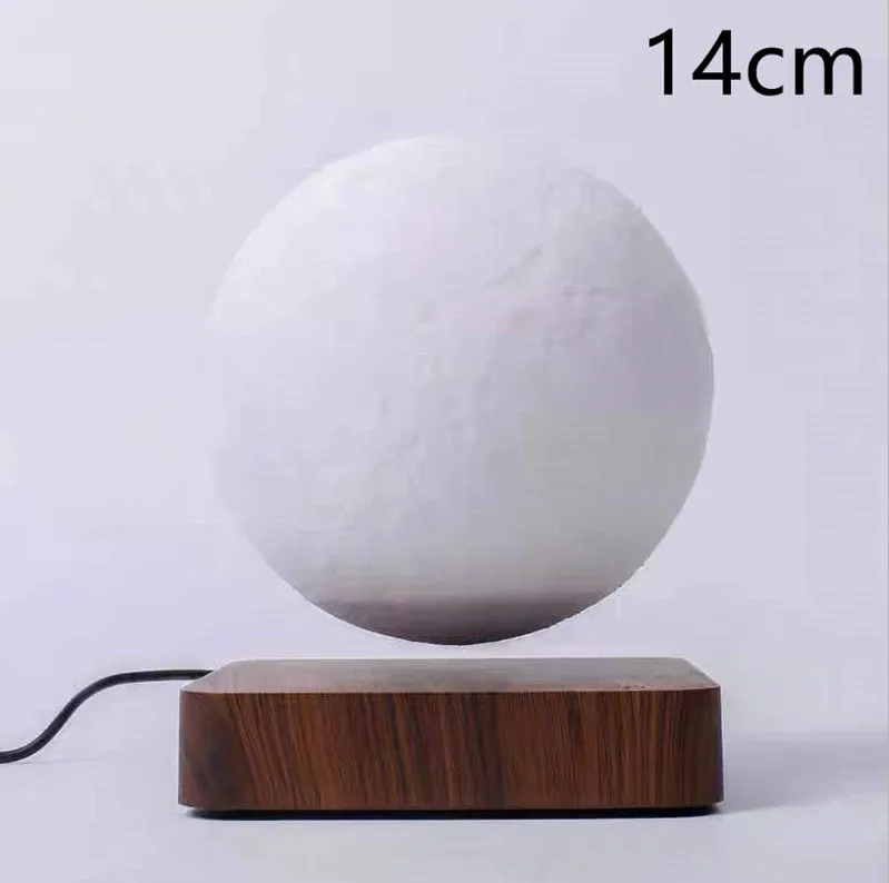 Magnetic levitation moon night light with 14cm 3D-printed planet suspended above a dark peach wood base