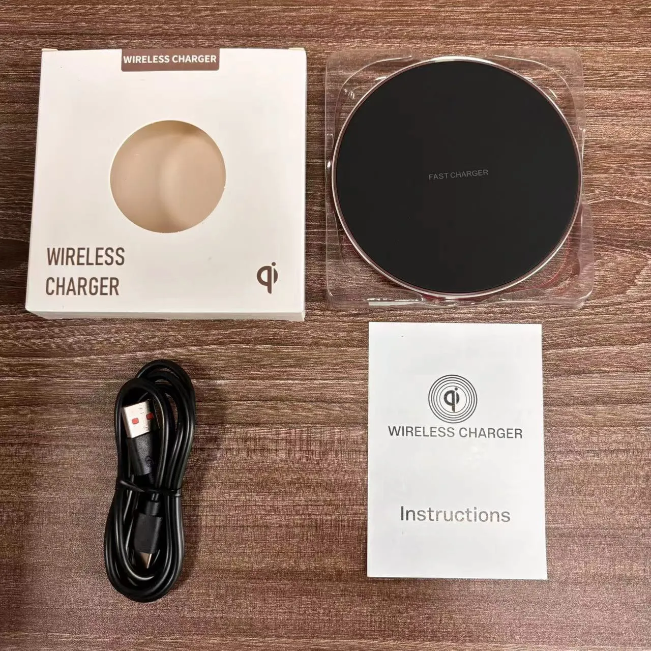 Aluminium alloy Qi wireless phone charger disc, 100mm diameter, 6mm thick, in black with rubber oil surface