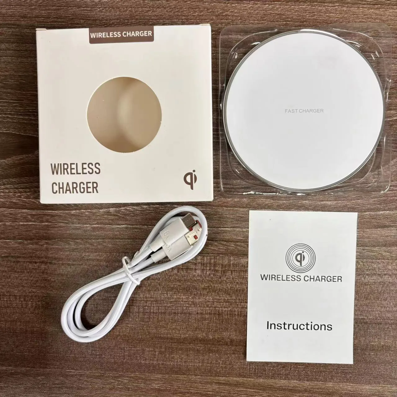Aluminium alloy Qi wireless phone charger disc, 100mm diameter, 6mm thick, in black with rubber oil surface