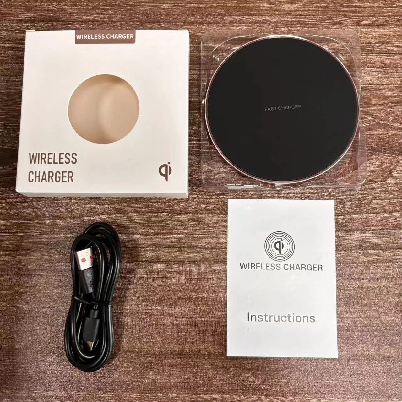 Aluminium alloy Qi wireless phone charger disc, 100mm diameter, 6mm thick, in black with rubber oil surface