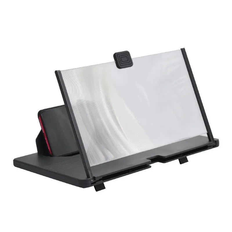 Black plastic mobile phone screen magnifier 12 inch 30cm diagonal on desk