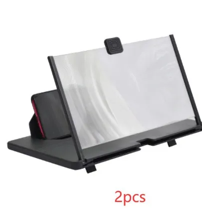 Black plastic mobile phone screen magnifier 12 inch 30cm diagonal on desk