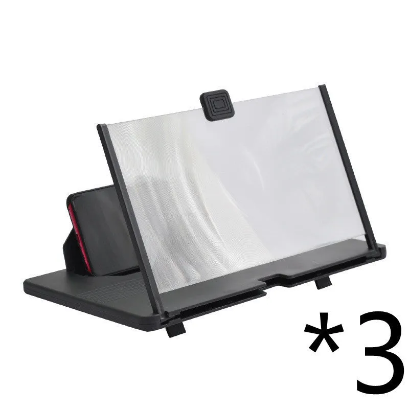 Black plastic mobile phone screen magnifier 12 inch 30cm diagonal on desk