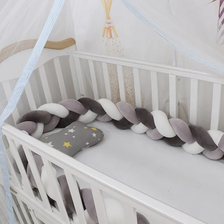 Baby crib bumper with braid knot design in spandex velvet, showing adjustable length protection around crib rails