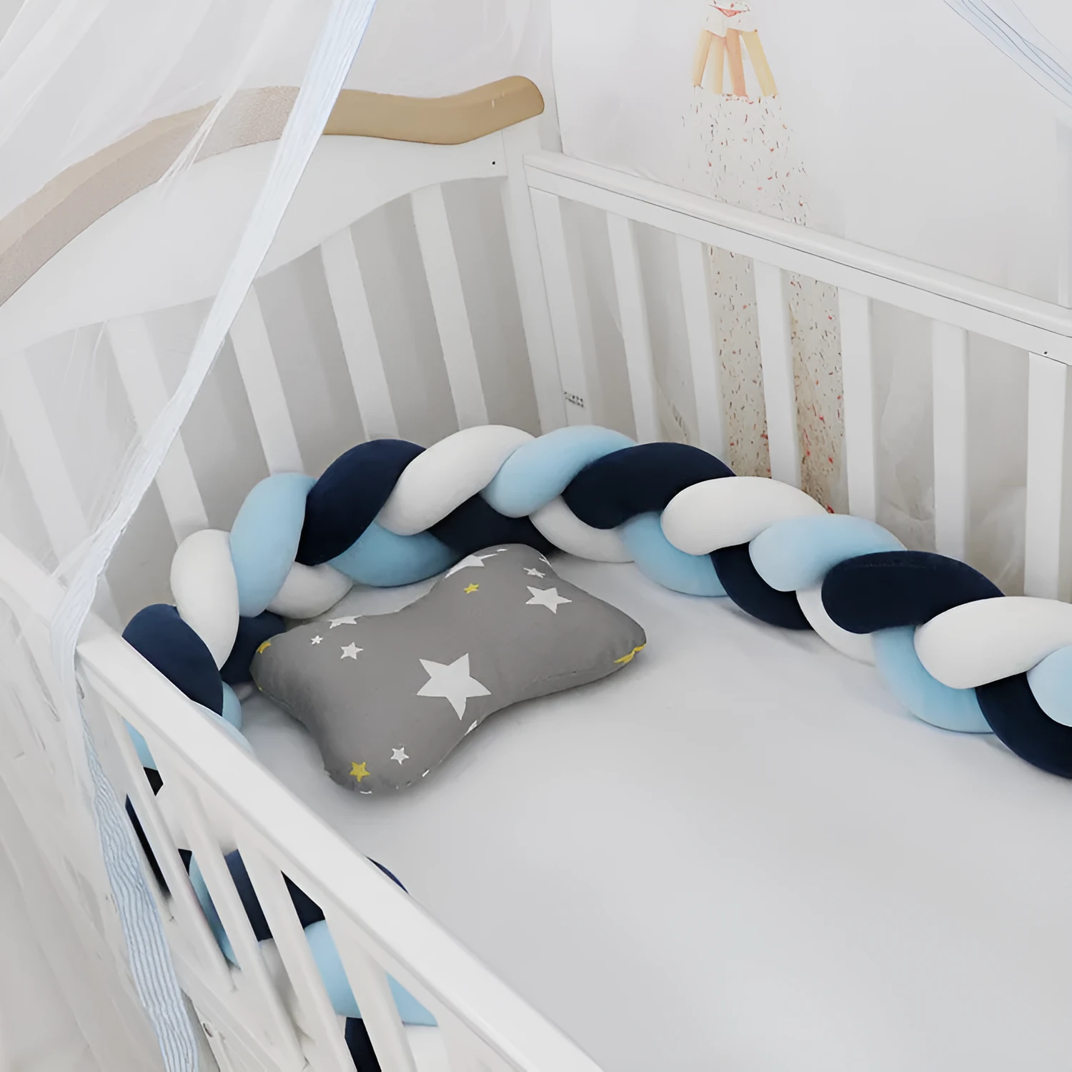 Long, flexible baby crib bumper pillow in spandex velvet, shown fitted around a white cot for safety protection.