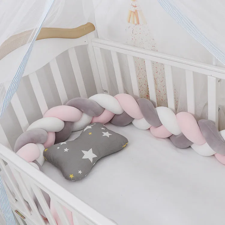 Long, flexible baby crib bumper pillow in spandex velvet, shown fitted around a white cot for safety protection.