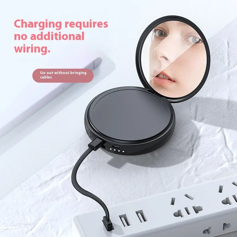 Small portable large capacity mobile power supply with plastic shell in black USB port and data cable